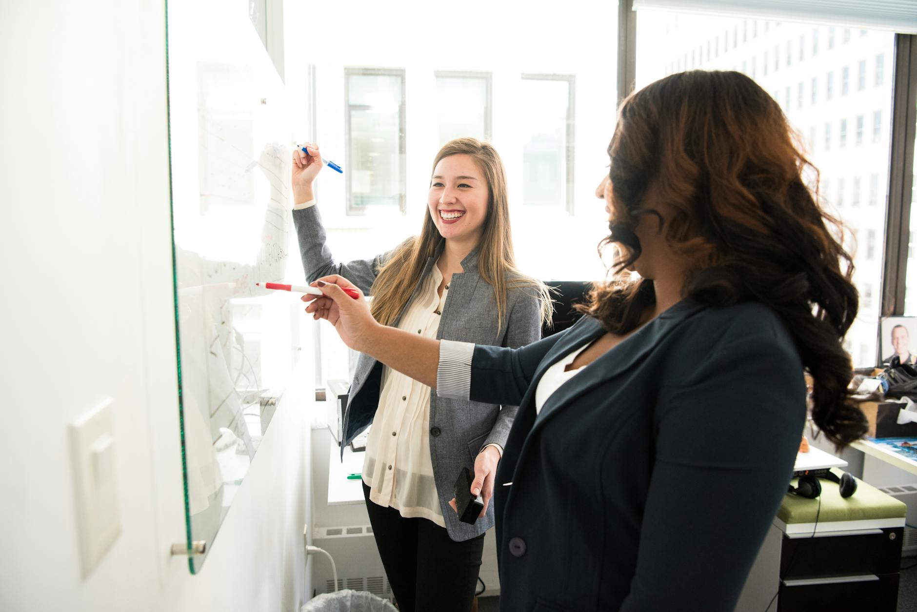 Team collaborating on a whiteboard